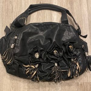 Black purse with rose embellishments shoulder bag